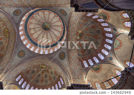 Istanbul,turkey,august 6, 2025. Blue mosque interior showcasing intricate islamic calligraphy, patterns, stained glass windows, and domes, reflecting religious grandeur Istanbul,turkey,august 6, 2025. Blue mosque interior showcasing intricate islamic calligraphy, patterns, stained glass windows, and domes, reflecting religious grandeur 143682949