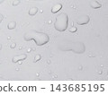 A close-up of a simple water droplet (image of rain, rainy season, waterproof coating) 143685195