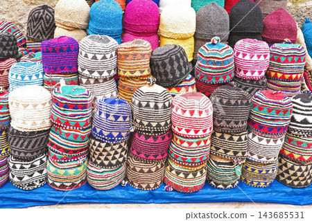 Colorful Handmade Knitted Hats at Traditional Market Colorful Handmade Knitted Hats at Traditional Market 143685531