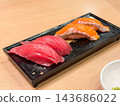 Nigiri sushi made with lean tuna and salmon. 143686022