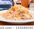 Sara Udon is a Japanese dish consisting of fried noodles topped with a thick, savory sauce made with plenty of vegetables. It's a local specialty of Nagasaki Prefecture. 143686040