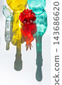 Close-Up of Colorful Glass Bottles with Refracted Light 143686620