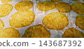 Traditional Indonesian crackers drying in sun 143687392