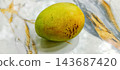 Single ripe mango on marble table 143687420
