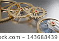 A macro view of a mechanical watch movement, featuring gold gears and ruby jewel bearings. 143688439