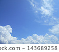 A white cloud spreading in the blue sky 143689258