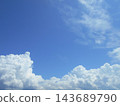 White clouds rising into the blue sky 143689790