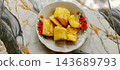 Boiled cassava on plate with marble table 143689793