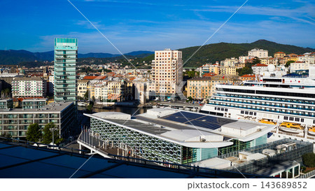 Savona, Italy - cruise ship moored at the dock of the historic port at Savona, Italy Savona, Italy - cruise ship moored at the dock of the historic port at Savona, Italy 143689852