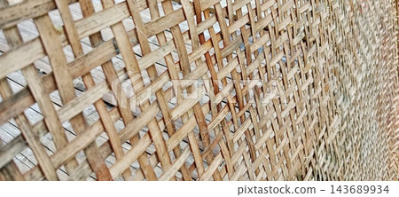 Diagonal bamboo woven texture close up Diagonal bamboo woven texture close up 143689934