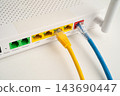 Ethernet cable with wireless router connect to internet service provider network. 143690447