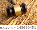 Judge gavel hammer with wheat ear grain from agriculture farm. 143690451