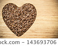Raw flax seeds linseed heart shaped 143693706
