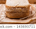 loaf of bread on backing paper 143693711