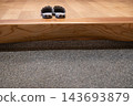 Slippers placed in the entrance 143693879