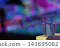 Water glass and bokeh 2 143695062