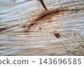 Weathered light wood texture with grain and knot close up 143696585