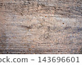 Weathered wood texture with scratches and stains closeup 143696601