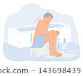 A naked senior man shivers before bathing in a cold bathroom in winter, posing a risk of heat shock. 143698439