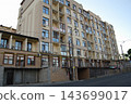 Modern multi story residential building exterior view. 143699017