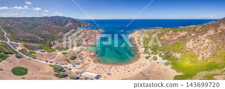 Aerial panorama of sheltered beach and clear water at Cala del Poltrona Aerial panorama of sheltered beach and clear water at Cala del Poltrona 143699720
