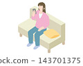 A woman operating a smartphone on the sofa 143701375