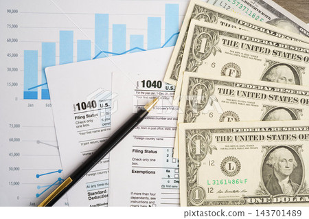 Tax form 1040 U.S. Individual Income Tax Return, business finance concept. Tax form 1040 U.S. Individual Income Tax Return, business finance concept. 143701489