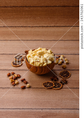 White cocoa butter chunks, used as an ingredient for making chocolate and sweets White cocoa butter chunks, used as an ingredient for making chocolate and sweets 143702061