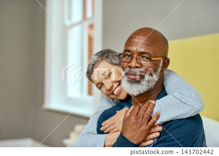 Bedroom, portrait and mature couple with hug, embracing love and bonding together in family home. Interracial marriage, senior husband and happy wife with dating, romance and affection with care Bedroom, portrait and mature couple with hug, embracing love and bonding together in family home. Interracial marriage, senior husband and happy wife with dating, romance and affection with care 143702442