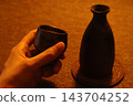 Bizen ware sake bottle and sake cup 143704252