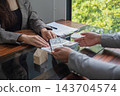 Real estate agent presenting and approved home loan contract. Real estate investment, Home mortgage concept 143704574