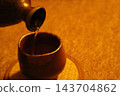 Bizen ware sake bottle and sake cup 143704862