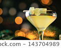 Luxury Christmas Cream Cocktail with Golden Bokeh and Festive Lights 143704989