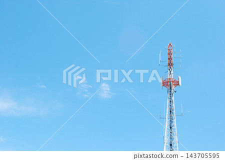 Telecommunication Tower Antenna Against Clear Blue Sky Telecommunication Tower Antenna Against Clear Blue Sky 143705595