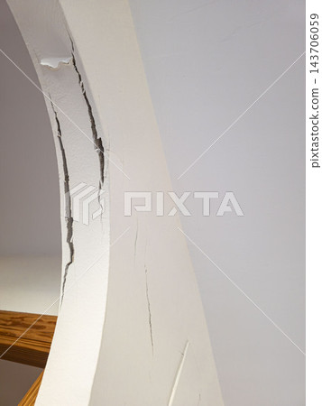 Severe structural damage following an earthquake with deep crack Severe structural damage following an earthquake with deep crack 143706059