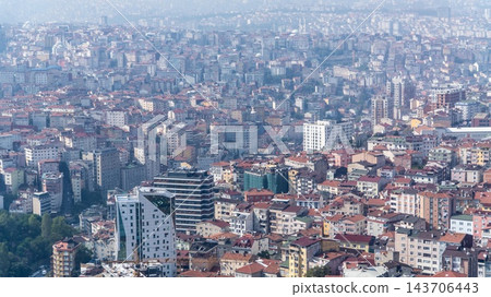Mass housing in Istanbul, Turkey, endless hazy apartment blocks across the hills of the crowded city 143706443