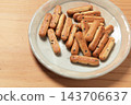 Long, thin biscuits 143706637