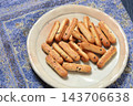 Long, thin biscuits 143706638