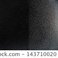 Rain water fall on car front glass before after coating to reduce surface tension. Water droplet and bead on glass combine into big drop and fall down. Abstract background, high speed photograph 143710020