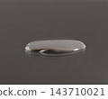 Pure water droplets on a dark surface tension. Water drops rolling off waterproof coating surface tension physics detail clean background, Macro Photography 143710021