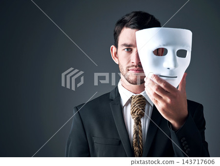 Portrait, business man and spy with mask in studio isolated on gray background. Fake face, suit and industrial espionage disguise of agent with rope noose for secret identity, confidential or fraud Portrait, business man and spy with mask in studio isolated on gray background. Fake face, suit and industrial espionage disguise of agent with rope noose for secret identity, confidential or fraud 143717606