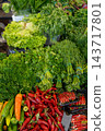 Fresh Market Display Of Green Herbs And Red Chilies With Lettuce And Parsley Bunches 143717801