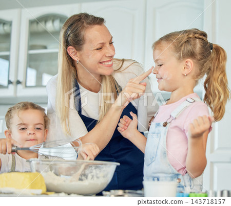 Mother, play or happy family baking with children in kitchen for development to prepare cookies in home. Nose, mom and playful kids learning recipe for bonding, cooking or dessert with love. Mother, play or happy family baking with children in kitchen for development to prepare cookies in home. Nose, mom and playful kids learning recipe for bonding, cooking or dessert with love. 143718157