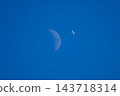 Airbus A350 flying alongside the moon 143718314