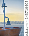 Frozen ship bell in winter time 143719405