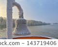 Frozen ship bell in winter time 143719406