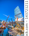 Tokyo cityscape, October 17th. New construction project for facilities above the west exit of Shibuya Station. A row of heavy machinery… 143721211