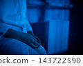 Calm guardian observes darkness. Serene guardian endures in silent darkness with tense patience. Peaceful sentry stays alert in tranquil night with tense yet patient demeanor 143722590