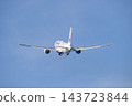 A JAL Boeing 767 passenger plane is retracting its landing gear as it takes off from Izumo Enmusubi Airport bound for Haneda: Izumo City, Shimane Prefecture (sunny) 143723844