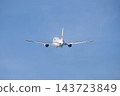 A JAL Boeing 767 passenger plane is retracting its landing gear as it takes off from Izumo Enmusubi Airport bound for Haneda: Izumo City, Shimane Prefecture (sunny) 143723849